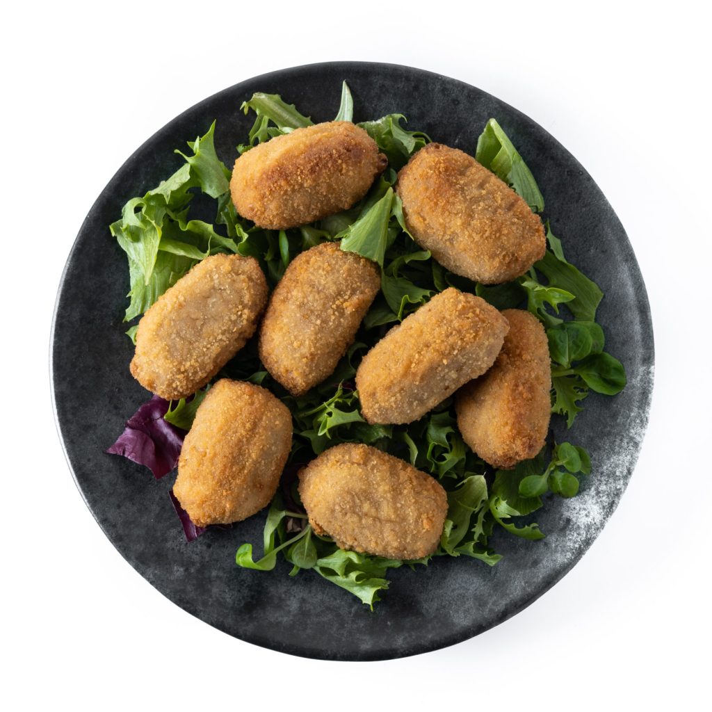 Traditional spanish fried croquettes isolated on white background